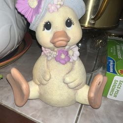 Duck figurine with flower hat!