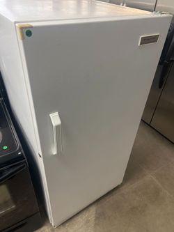 Frigidaire upright freezer / frost free  -free delivery