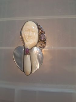 Carved Face Brooch with Gemstones