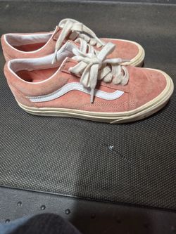 Pink vans with white stripes