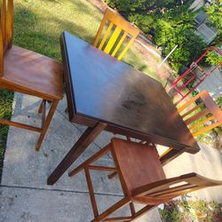 Table and chairs 4 wooden chairs and wooden dinning table  $100.00 great condition for the dinner area ✅✅💯