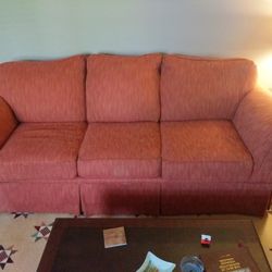 Nice Orange / Red / Peach Couch 