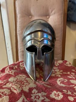 Greek helmet (Corinthian Hoplite) w/ wooden stand C description