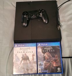 PS4 Console with Controller and 2 Games