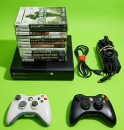 Microsoft Xbox 360 slim with 2 controllers 12 games HDMI cord power supply