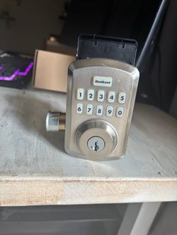 Keyless door entry deadbolt