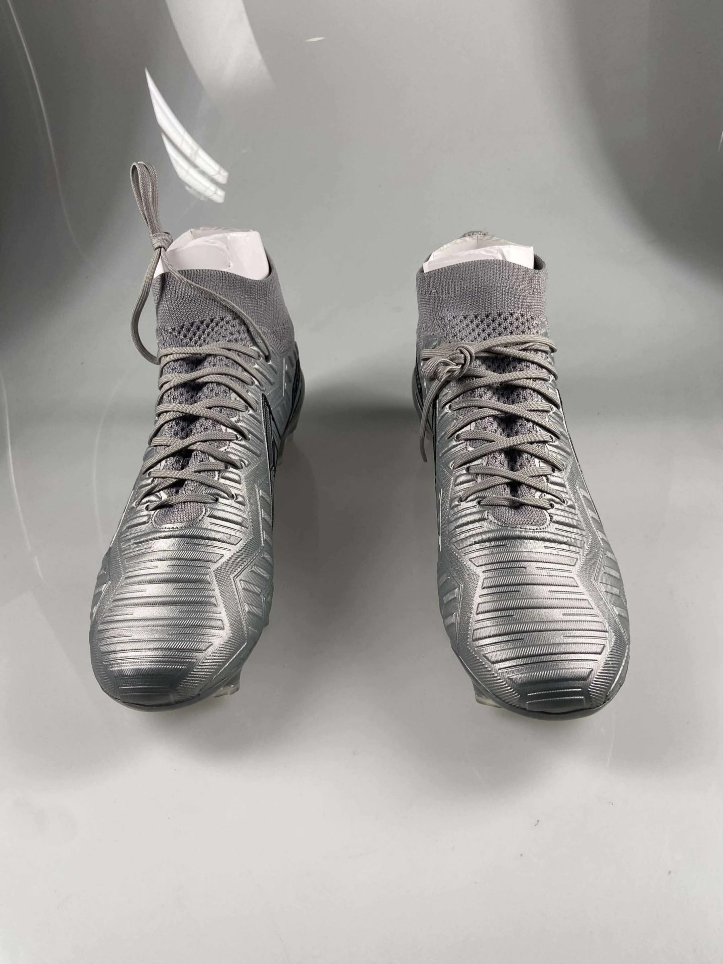 Zapatos pirma de botita color plata