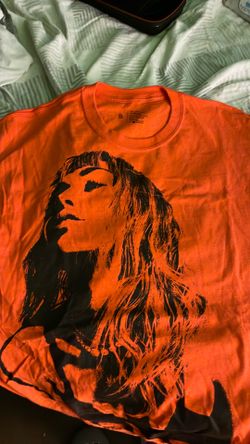 Miley Cyrus Orange oversized shirt