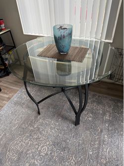 GLASS DINING TABLE