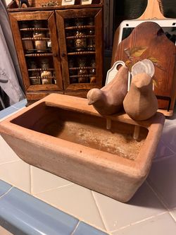 Terracotta bird bath
