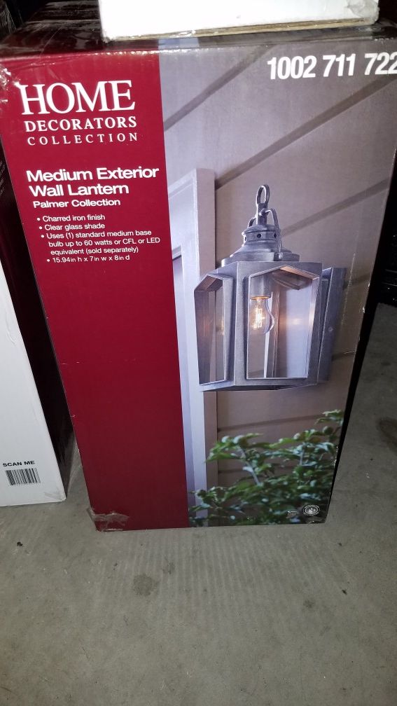 Two medium and one small external wall light