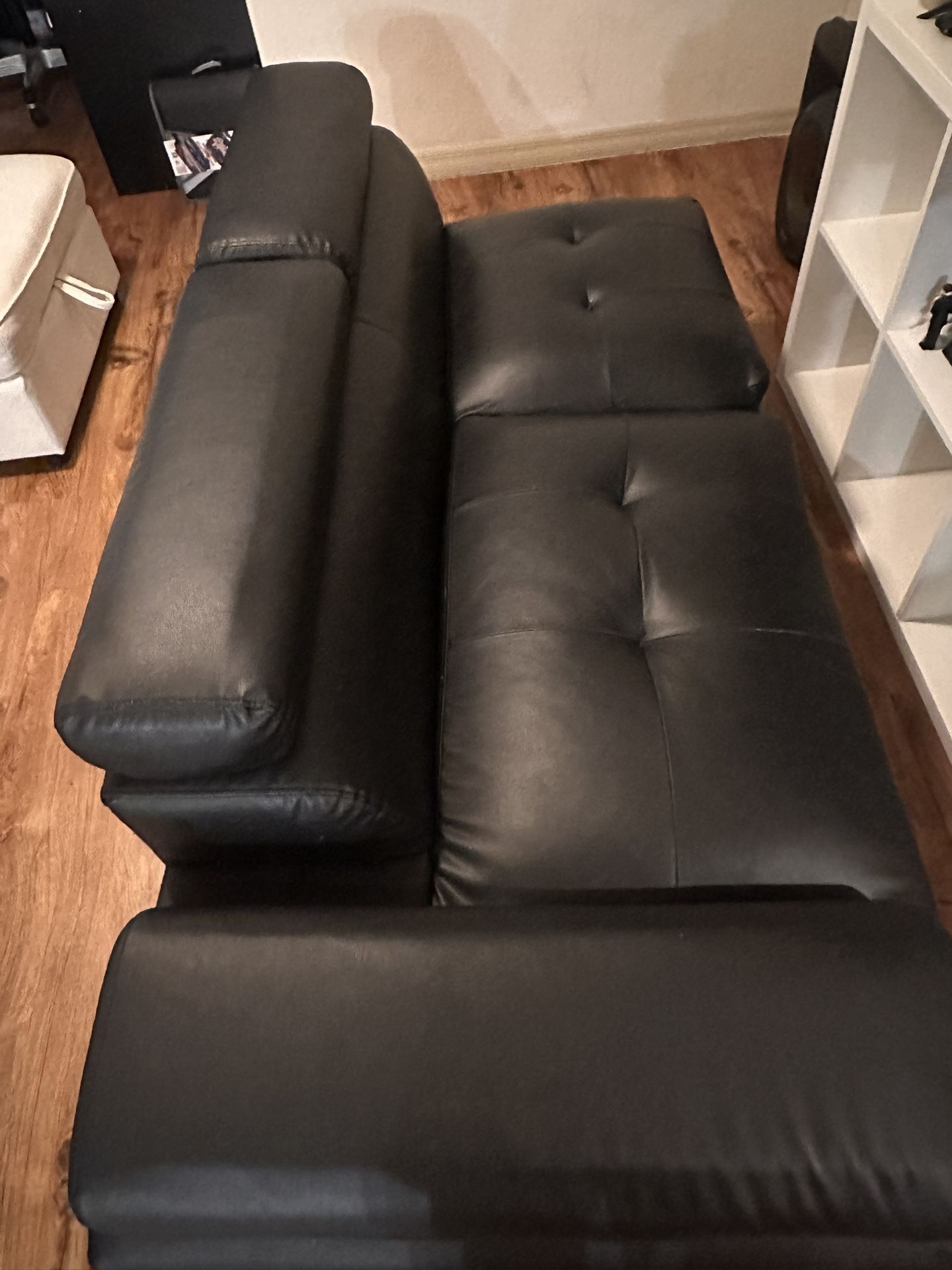 Black like-leather sofa