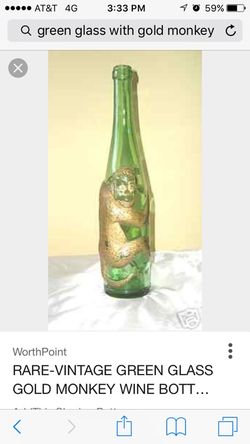 Vintage German Green wine bottle with gold monkey