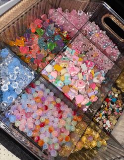 Bunch of beads, charms & accessories and pens
