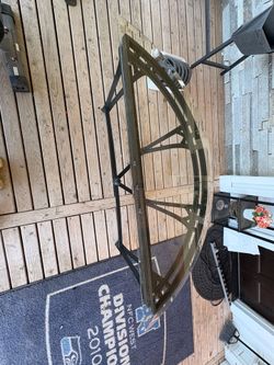 Wrought iron and glass demilune console table