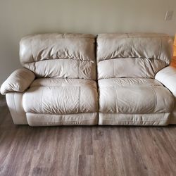 Leather Dual Reclining Couch. Breaks down into two pieces for moving.