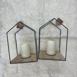 Metal and wood candle holders with LED candles included. Bought for engagement party. There’s 6