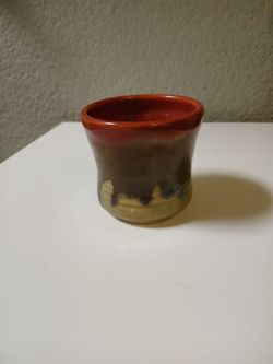 Multicolored drip glazed pottery cup