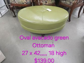 Oval Avocado Green Leather Ottoman We are located at 2811 East Bell road. Another Time Around Furniture.