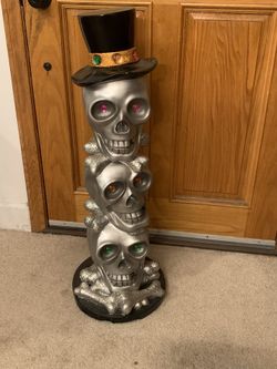 Whimsical Light -Up Stacked Skull Halloween Decoration