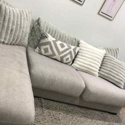 L sectional couch and rug 