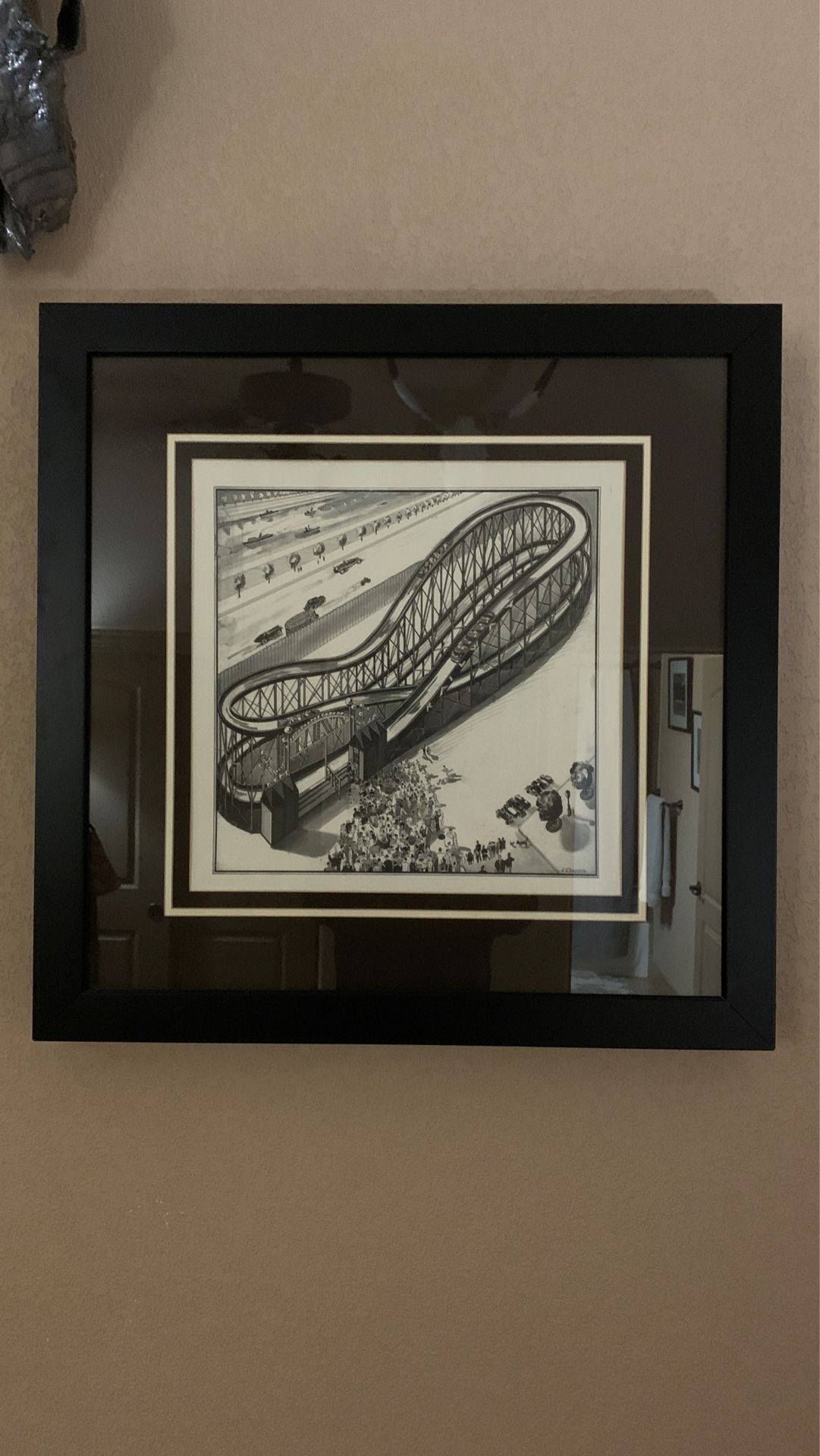 Framed Roller coaster prints.