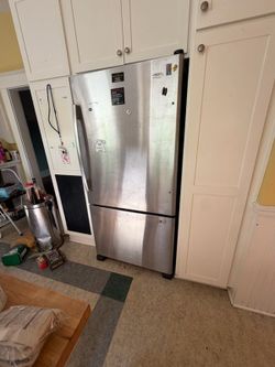 Like New Whirlpool Stainless Fridge/Freezer