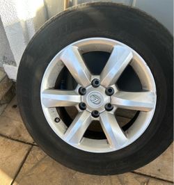 265/60R18 bridgestone tires and lexus rims for sale