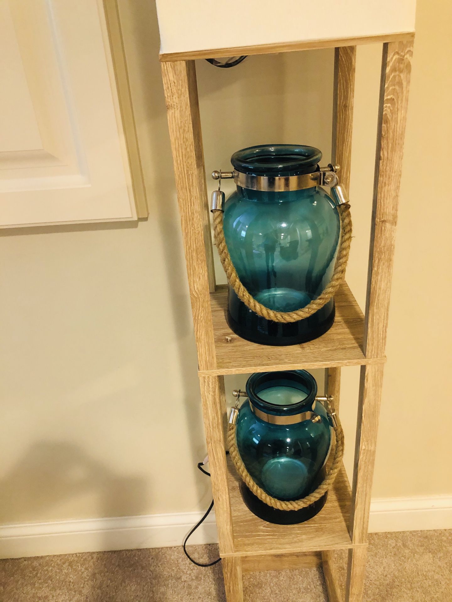 Two blue candle holders