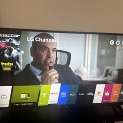LG 49” UHD 4K Smart TV
