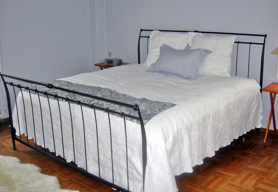 King size bed frame with foot board and headboard. Can also fit 2 XL twin mattresses.