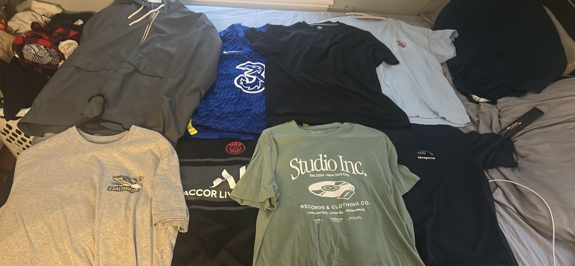T Shirts/Jerseys + Rain Coat. All used but like new.