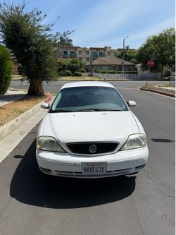 2002 Mercury Sable, 130k miles, clean daily