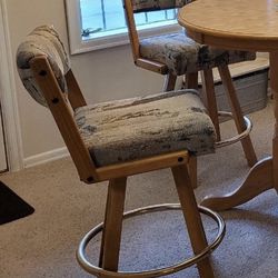 2 Swivel Oak Bistro Chairs And Footstool