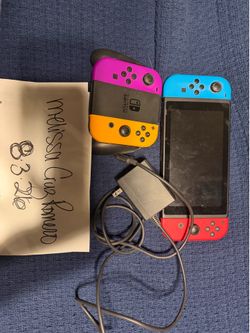 Nintendo switch with a game attached