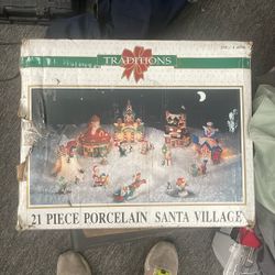 21. Peace, porcelain Santa village Like New
