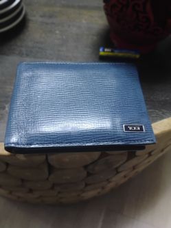 Tumi blue wallet