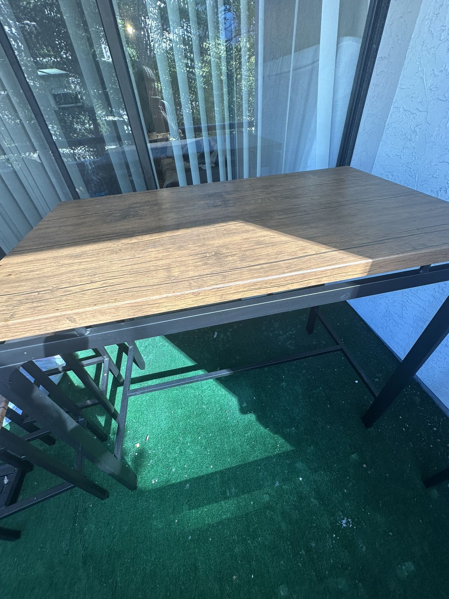 high table with 4 bar stools