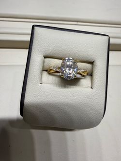 Moissanite Oval Solitaire Ring with Twisted Band