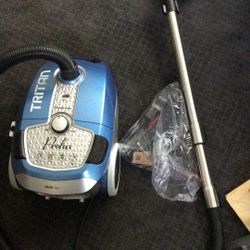 Prolix Vacuum Tristan Blue Model Vcb46a14a.   $90 With Extra Hepa Filters