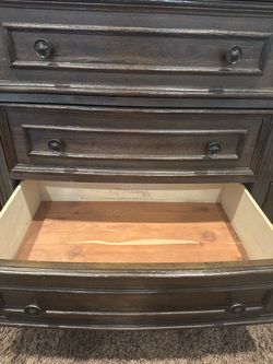 Dark Wood Dresser with Multiple Drawers