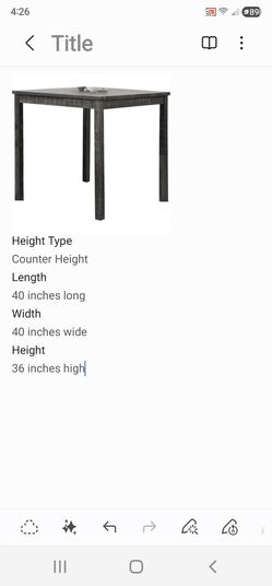 Black counter height table and chairs