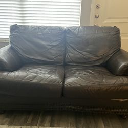 Genuine leather love seat! Willing to negotiate