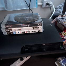 PS3 Slim With 4 Games 
