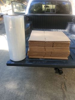 Shrink wrap and 30 boxes size 12x8x8