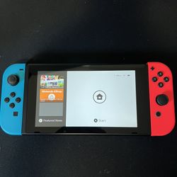 Nintendo Switch W/ Pokémon, Mario, & Zelda