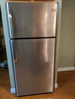 Frigidaire 18-cu ft Top-Freezer Refrigerator (EasyCare Stainless Steel) The fridge is not working ( not cooling) the freezer is ice cold and works