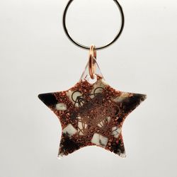 Love Star Keychain/Pocket Orgonite, Provides EMF Protection, & Emotional Balance

Dimensions:
Weighs  2.0 oz 
Height 2.7 in. 
Width 2.7  in. 
Thick 0.