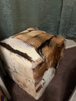 COWHIDE OTTOMAN
