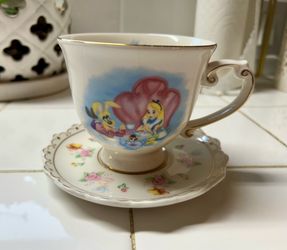 Alice in wonderland tea cup and saucer